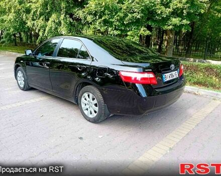 Черный Тойота Камри, объемом двигателя 2.4 л и пробегом 248 тыс. км за 7500 $, фото 1 на Automoto.ua