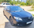 Черный Тойота Камри, объемом двигателя 2.4 л и пробегом 267 тыс. км за 8200 $, фото 1 на Automoto.ua