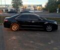 Черный Тойота Камри, объемом двигателя 2.4 л и пробегом 322 тыс. км за 7000 $, фото 1 на Automoto.ua