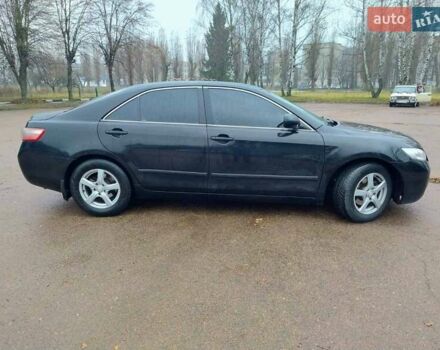Черный Тойота Камри, объемом двигателя 2.4 л и пробегом 367 тыс. км за 7900 $, фото 3 на Automoto.ua