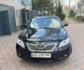 Черный Тойота Камри, объемом двигателя 2.4 л и пробегом 286 тыс. км за 8500 $, фото 1 на Automoto.ua