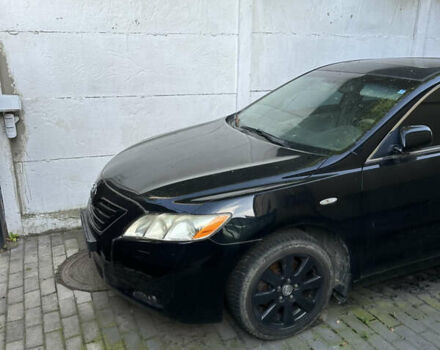 Чорний Тойота Камрі, об'ємом двигуна 2.36 л та пробігом 340 тис. км за 10500 $, фото 1 на Automoto.ua