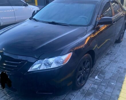 Черный Тойота Камри, объемом двигателя 2.4 л и пробегом 274 тыс. км за 7500 $, фото 1 на Automoto.ua