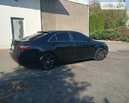 Чорний Тойота Камрі, об'ємом двигуна 2.36 л та пробігом 270 тис. км за 8800 $, фото 9 на Automoto.ua