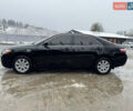 Чорний Тойота Камрі, об'ємом двигуна 2.4 л та пробігом 260 тис. км за 10500 $, фото 3 на Automoto.ua