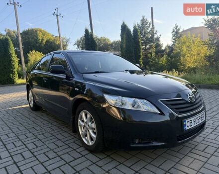 Черный Тойота Камри, объемом двигателя 2.36 л и пробегом 260 тыс. км за 5600 $, фото 1 на Automoto.ua