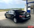 Черный Тойота Камри, объемом двигателя 2.4 л и пробегом 320 тыс. км за 8000 $, фото 1 на Automoto.ua