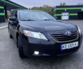 Черный Тойота Камри, объемом двигателя 2.4 л и пробегом 240 тыс. км за 8700 $, фото 1 на Automoto.ua