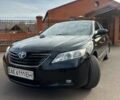 Черный Тойота Камри, объемом двигателя 2.4 л и пробегом 161 тыс. км за 7800 $, фото 1 на Automoto.ua