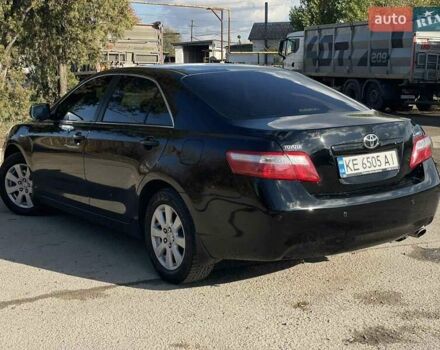 Черный Тойота Камри, объемом двигателя 2.4 л и пробегом 244 тыс. км за 8700 $, фото 9 на Automoto.ua