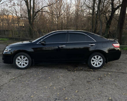 Черный Тойота Камри, объемом двигателя 2.4 л и пробегом 366 тыс. км за 6500 $, фото 1 на Automoto.ua