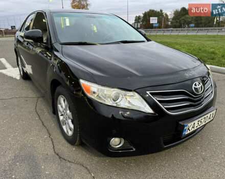 Черный Тойота Камри, объемом двигателя 2.4 л и пробегом 189 тыс. км за 8600 $, фото 1 на Automoto.ua