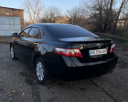 Черный Тойота Камри, объемом двигателя 2.4 л и пробегом 366 тыс. км за 6500 $, фото 2 на Automoto.ua