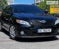 Черный Тойота Камри, объемом двигателя 2.49 л и пробегом 200 тыс. км за 10500 $, фото 1 на Automoto.ua