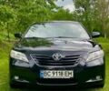 Черный Тойота Камри, объемом двигателя 2.36 л и пробегом 116 тыс. км за 9400 $, фото 1 на Automoto.ua