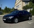 Черный Тойота Камри, объемом двигателя 2.4 л и пробегом 252 тыс. км за 6500 $, фото 1 на Automoto.ua