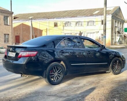 Черный Тойота Камри, объемом двигателя 2.4 л и пробегом 400 тыс. км за 7100 $, фото 2 на Automoto.ua
