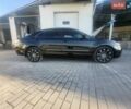 Черный Тойота Камри, объемом двигателя 2.4 л и пробегом 238 тыс. км за 8300 $, фото 1 на Automoto.ua