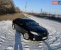 Черный Тойота Камри, объемом двигателя 2.4 л и пробегом 191 тыс. км за 10800 $, фото 1 на Automoto.ua