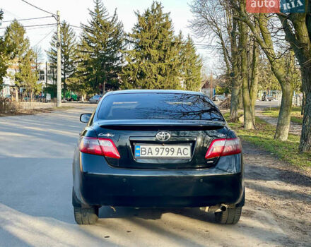 Черный Тойота Камри, объемом двигателя 2.4 л и пробегом 450 тыс. км за 7200 $, фото 1 на Automoto.ua