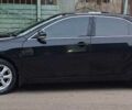 Черный Тойота Камри, объемом двигателя 2.36 л и пробегом 366 тыс. км за 9000 $, фото 1 на Automoto.ua