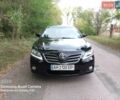 Черный Тойота Камри, объемом двигателя 2.4 л и пробегом 190 тыс. км за 10900 $, фото 1 на Automoto.ua