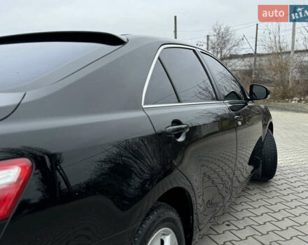 Черный Тойота Камри, объемом двигателя 2.4 л и пробегом 206 тыс. км за 10750 $, фото 9 на Automoto.ua
