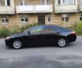 Черный Тойота Камри, объемом двигателя 2.4 л и пробегом 257 тыс. км за 9300 $, фото 1 на Automoto.ua