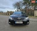 Черный Тойота Камри, объемом двигателя 2.36 л и пробегом 197 тыс. км за 11000 $, фото 1 на Automoto.ua