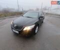 Черный Тойота Камри, объемом двигателя 2.5 л и пробегом 328 тыс. км за 6500 $, фото 1 на Automoto.ua