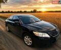 Черный Тойота Камри, объемом двигателя 2.5 л и пробегом 269 тыс. км за 10700 $, фото 1 на Automoto.ua
