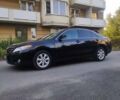 Черный Тойота Камри, объемом двигателя 2.4 л и пробегом 257 тыс. км за 9300 $, фото 6 на Automoto.ua