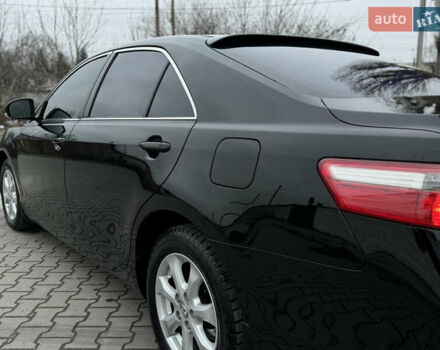 Черный Тойота Камри, объемом двигателя 2.4 л и пробегом 206 тыс. км за 10750 $, фото 21 на Automoto.ua