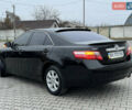 Черный Тойота Камри, объемом двигателя 2.4 л и пробегом 206 тыс. км за 10750 $, фото 22 на Automoto.ua