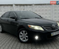Черный Тойота Камри, объемом двигателя 2.4 л и пробегом 206 тыс. км за 10750 $, фото 1 на Automoto.ua