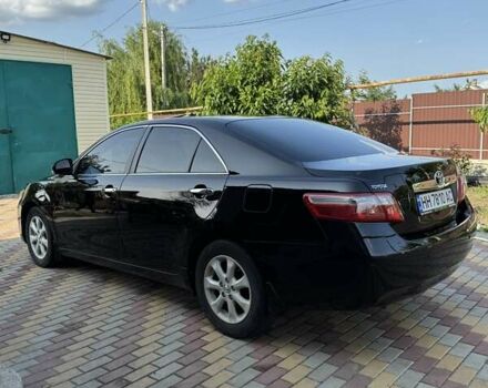 Черный Тойота Камри, объемом двигателя 2.36 л и пробегом 193 тыс. км за 10500 $, фото 1 на Automoto.ua
