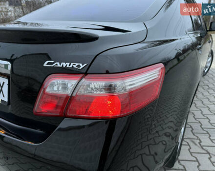 Черный Тойота Камри, объемом двигателя 2.4 л и пробегом 206 тыс. км за 10750 $, фото 36 на Automoto.ua