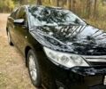 Черный Тойота Камри, объемом двигателя 2.5 л и пробегом 210 тыс. км за 10000 $, фото 1 на Automoto.ua
