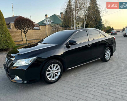 Черный Тойота Камри, объемом двигателя 2.5 л и пробегом 220 тыс. км за 13750 $, фото 18 на Automoto.ua