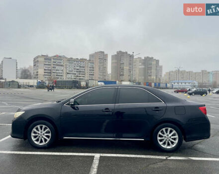 Черный Тойота Камри, объемом двигателя 2.49 л и пробегом 202 тыс. км за 12400 $, фото 7 на Automoto.ua