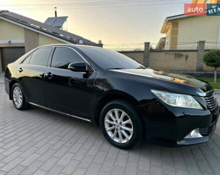 Черный Тойота Камри, объемом двигателя 2.5 л и пробегом 220 тыс. км за 13750 $, фото 17 на Automoto.ua