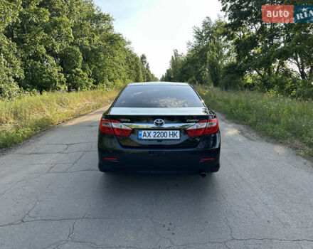 Черный Тойота Камри, объемом двигателя 2.49 л и пробегом 188 тыс. км за 13500 $, фото 4 на Automoto.ua