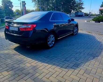 Черный Тойота Камри, объемом двигателя 2.5 л и пробегом 180 тыс. км за 13100 $, фото 2 на Automoto.ua