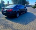 Черный Тойота Камри, объемом двигателя 2.5 л и пробегом 180 тыс. км за 13100 $, фото 2 на Automoto.ua