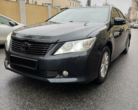 Черный Тойота Камри, объемом двигателя 2.5 л и пробегом 280 тыс. км за 10999 $, фото 1 на Automoto.ua