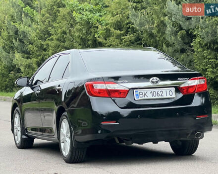 Черный Тойота Камри, объемом двигателя 2.5 л и пробегом 198 тыс. км за 13500 $, фото 15 на Automoto.ua