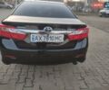 Черный Тойота Камри, объемом двигателя 2.5 л и пробегом 294 тыс. км за 13000 $, фото 10 на Automoto.ua