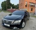 Черный Тойота Камри, объемом двигателя 2.5 л и пробегом 343 тыс. км за 11000 $, фото 1 на Automoto.ua
