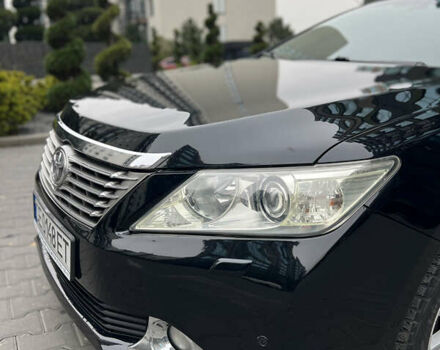 Черный Тойота Камри, объемом двигателя 3.46 л и пробегом 217 тыс. км за 13500 $, фото 1 на Automoto.ua