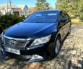 Черный Тойота Камри, объемом двигателя 2.5 л и пробегом 21000 тыс. км за 13600 $, фото 1 на Automoto.ua